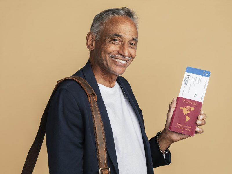 Happy Indian man on a business trip