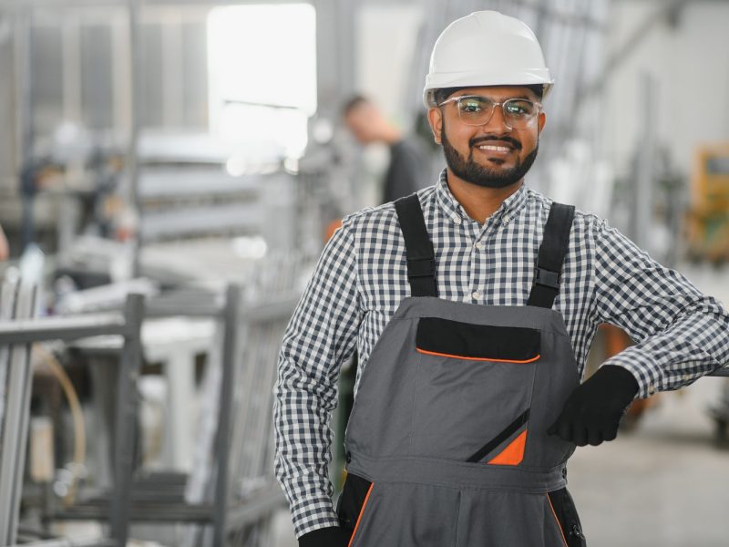 PVC industry worker or operator making frames for windows and doors.
